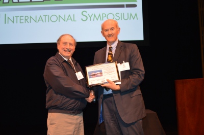 Fred Grace receiving the Neill Griffiths Award from Ian Cullis (close-up)