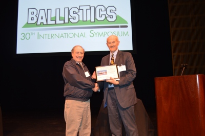 Fred Grace receiving the Neill Griffiths Award from Ian Cullis